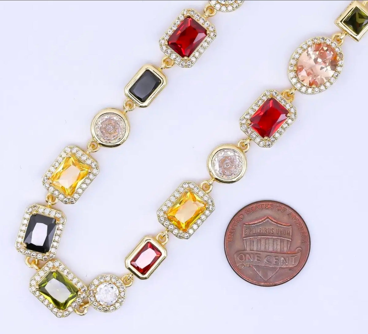 Twenty four carat filled 6.7 millimeters geometric multicolor micropaved cv gemstone 17.5 in necklace.