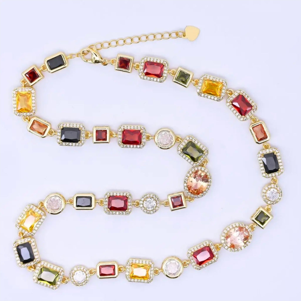 Twenty four carat filled 6.7 millimeters geometric multicolor micropaved cv gemstone 17.5 in necklace.