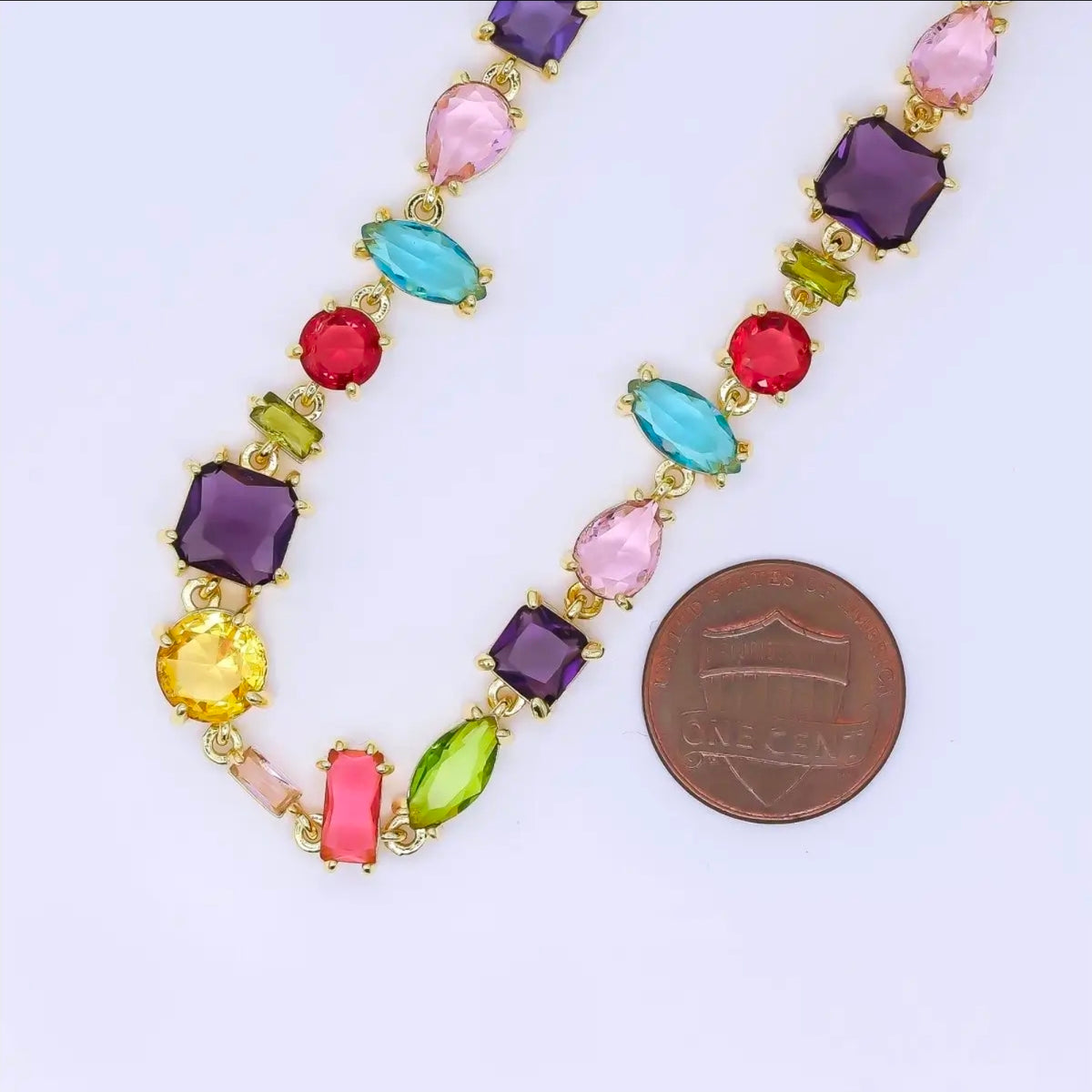 Twenty four carat filled 6.7 millimeters geometric multicolor gemstone 17 in necklace.
