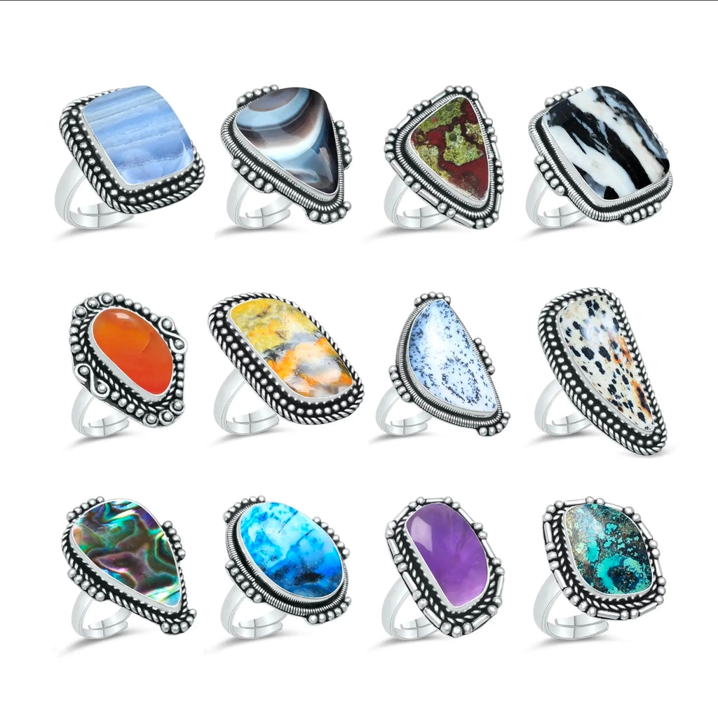Assorted crystal rings silver plated various sizes