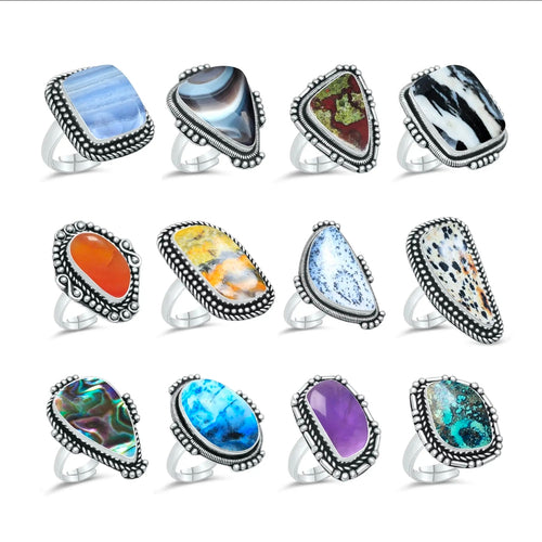 Assorted crystal rings silver plated various sizes